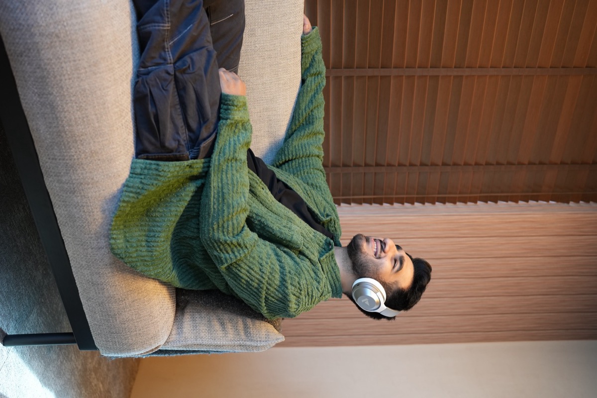 Creator relaxing with boAt headphones